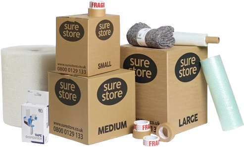 surestore-box Three cardboard boxes labeled "Small," "Medium," and "Large" from Sure Store, placed on a surface. Nearby items include bubble wrap, a roll of packing tape, and a tape dispenser.